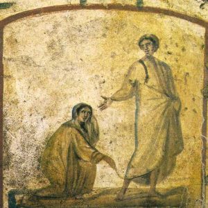 Jesus healing the bleeding woman, ancient drawing in the Roman catacombs. 